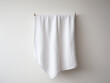 Decorative element of white towel texture hung on the wall