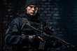 © zgurski1980 - caucasian man, special forces soldier, armed man in black gear holding an assault rifle