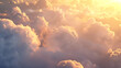 an expansive view of fluffy clouds illuminated by the soft glow of a setting or rising sun.