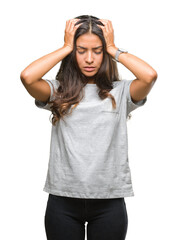 Wall Mural - Young beautiful arab woman over isolated background suffering from headache desperate and stressed because pain and migraine. Hands on head.