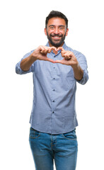 Sticker - Adult hispanic man over isolated background smiling in love showing heart symbol and shape with hands. Romantic concept.