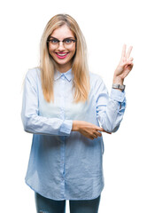 Sticker - Young beautiful blonde business woman wearing glasses over isolated background smiling with happy face winking at the camera doing victory sign. Number two.