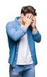 © Krakenimages.com - Young handsome man wearing sunglasses over isolated background with sad expression covering face with hands while crying. Depression concept.
