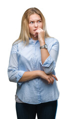 Poster - Young caucasian business woman over isolated background looking stressed and nervous with hands on mouth biting nails. Anxiety problem.