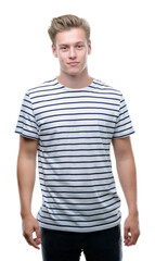 Poster - Young handsome blond man wearing stripes sailor t-shirt with a confident expression on smart face thinking serious