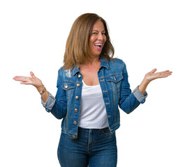 Sticker - Beautiful middle age woman wearing casual denim jacket over isolated background Smiling showing both hands open palms, presenting and advertising comparison and balance