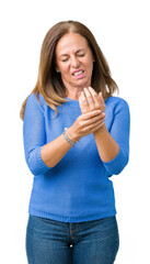 Sticker - Middle age beautiful woman wearing winter sweater over isolated background Suffering pain on hands and fingers, arthritis inflammation