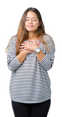 Sticker - Young beautiful brunette woman wearing stripes sweater over isolated background smiling with hands on chest with closed eyes and grateful gesture on face. Health concept.