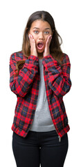 Sticker - Young beautiful brunette woman wearing a jacket over isolated background afraid and shocked with surprise expression, fear and excited face.