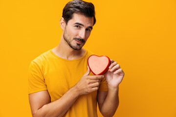 Man heart gift romance portrait concept valentine romantic love shape studio happy