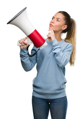 Sticker - Beautiful young woman holding megaphone serious face thinking about question, very confused idea