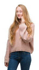 Sticker - Blonde teenager woman wearing pink sweater touching mouth with hand with painful expression because of toothache or dental illness on teeth. Dentist concept.