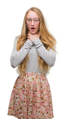 Sticker - Blonde teenager woman wearing flowers skirt shouting and suffocate because painful strangle. Health problem. Asphyxiate and suicide concept.