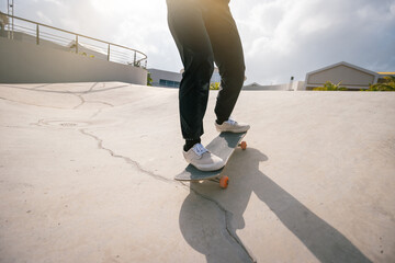 Wall Mural - Skateboarder skateboarding at skatepark in city