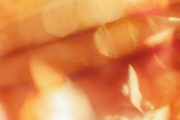 Wall Mural - abstract bokeh colorful background, natural flare lights, yellow orange monochromatic photo with opt