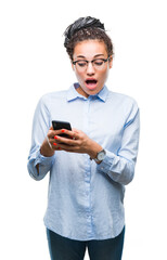 Poster - Young braided hair african american business girl using smartphone over isolated background scared in shock with a surprise face, afraid and excited with fear expression