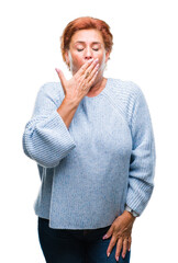 Sticker - Atrractive senior caucasian redhead woman wearing winter sweater over isolated background bored yawning tired covering mouth with hand. Restless and sleepiness.