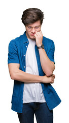 Sticker - Young handsome man wearing glasses over isolated background thinking looking tired and bored with depression problems with crossed arms.