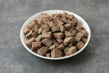 Wall Mural - Boiled cow liver on white plate
