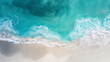 An aerial view capturing the turquoise ocean waves gently meeting the sandy beach, evoking serenity and natural beauty