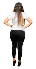 Canvas Print - Young beautiful woman wearing casual white t-shirt standing backwards looking away with arms on body