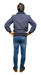 Sticker - Middle age handsome man wearing a jacket standing backwards looking away with arms on body