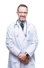 Wall Mural - Middle age senior hoary doctor man wearing medical uniform isolated background with a happy and cool smile on face. Lucky person.