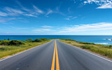 Fototapeta  - coastal highway leading directly to the sea - holiday road-trip promotion, travel vacation.