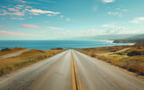 Fototapeta  - coastal highway leading directly to the sea - holiday road-trip promotion, travel vacation.