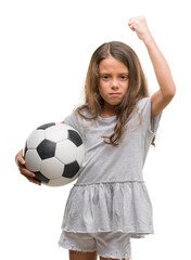 Poster - Brunette hispanic girl holding soccer football ball annoyed and frustrated shouting with anger, crazy and yelling with raised hand, anger concept