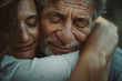 Two elderly people of mixed race hugging both, close up portrait of old people.