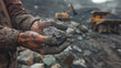 a miner's hands as they handle a rugged geological sample at an open-cast mining site. The hands, dirty and marked from labor, contrast starkly with the precious ore they hold