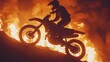 Dirt bike doing a wheelie engulfed in flames, close-up shot of rider silhouette in the style of cinematic