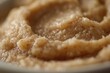 © Julia Jones - Creamy Rice Pudding Topped with Almonds and Cinnamon in a White Bowl