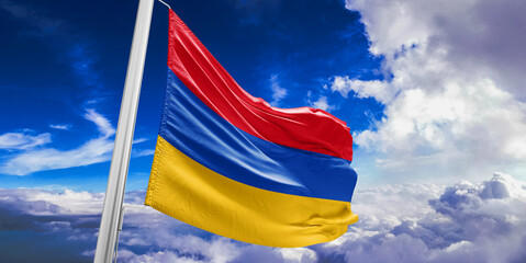 Armenia national flag cloth fabric waving on beautiful Blue Sky Background.