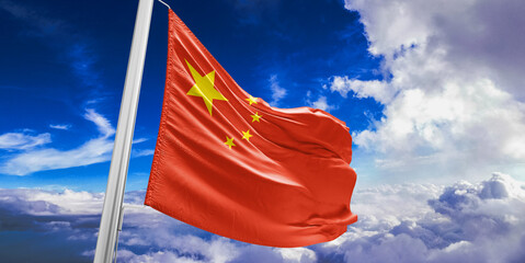 Wall Mural - China national flag cloth fabric waving on beautiful Blue Sky Background.