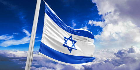 Israel national flag cloth fabric waving on beautiful Blue Sky Background.