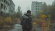A solo travele walks through the desolate streets of Pripyat, the ghost town near Chernobyl.