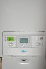 Vertical shot of details on a modern energy temperature system in a house