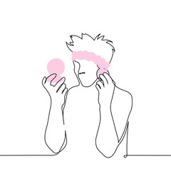 Wall Mural - man with a Headband on his head applies makeup - one line art vector. hand-drawn sketch of a man applying blush. male beauty blogger