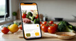 Online cookbook and shopping list through mobile app marketplace. Phone with lunch recipe and ingredients on the screen on the kitchen counter. Modern domestic lifestyle.