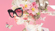 Modern contemporary paper art collage. Coquette aesthetic horizontal poster with beautiful woman in heart shaped sunglasses portrait and flowers