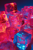 Fototapeta Na ścianę - A close-up photo of a pile of translucent ice cubes illuminated with pink and blue light.
