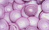 Fototapeta  - Red onion rings sliced texture background, Group of chopped onion top view