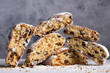 Slices of Traditional European Christmas pastry bread stollen cakes against grey background
