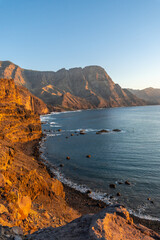 Wall Mural - Cliffs and the coast of Agaete at summer sunset in Gran Canaria. Spain