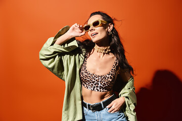 a stylish woman wearing a leopard print top and jeans, exuding confidence and summertime fashion on 