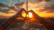 Female Hands Forming a Heart Shape at Sunset in front of the Eiffel Tower