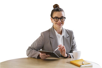 A young female manager uses a tablet and the Internet in the office.