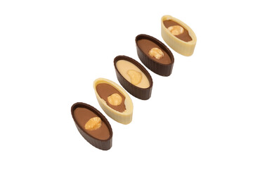 Wall Mural - Chocolate candy with a nut isolated on a white background.